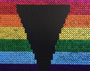 Max logo made from ribbons of pride colours